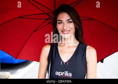 4th June 2022; Circuito de Catalunya, Montmelo,  Barcelona, Spain: Gran Premi Monster Energy de Catalunya, MotoGP of Spain, qualification sessions: a MotoGP paddock girl poses during the free practice Stock Photo