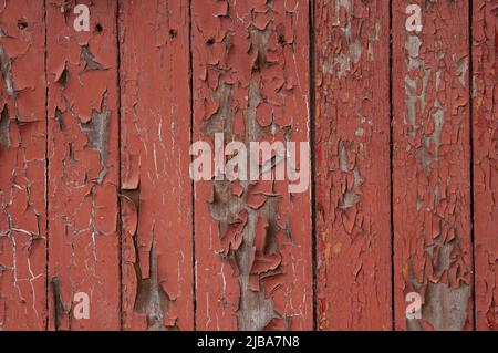 grunge background: stripped old boards painted with red paint Stock Photo