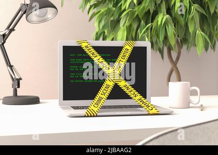 A notebook with a message that the data has been encrypted and a warning tape "Crime Scene - don't enter". Concept for ransomware encrypting computers Stock Photo