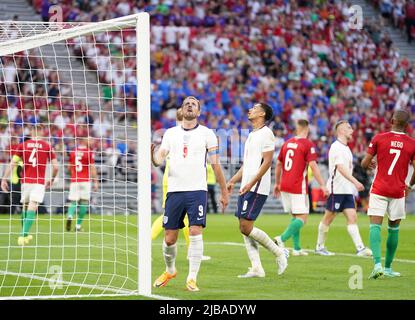 England's Harry Kane and Jude Bellingham react during the UEFA Nations League match at the Puskas Arena, Budapest. Picture date: Saturday June 4, 2022. Stock Photo