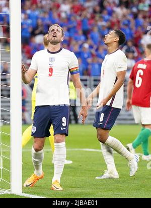 England's Harry Kane and Jude Bellingham react during the UEFA Nations League match at the Puskas Arena, Budapest. Picture date: Saturday June 4, 2022. Stock Photo
