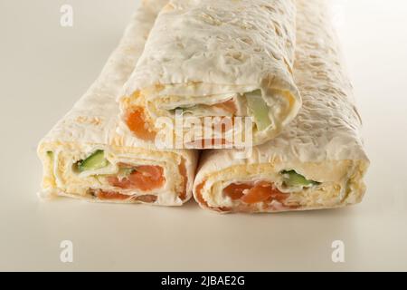 thin flour rolls stuffed with seafood and vegetables Stock Photo