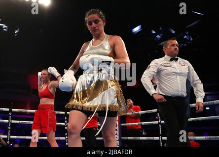 Skye Nicolson celebrates victory in the feather weight bout at the
