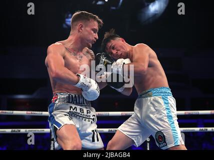 Dalton Smith (left) and Mauro Perouene in the World Boxing Council International Silver Super Light Title at the Motorpoint Arena Cardiff. Picture date: Saturday June 4, 2022. Stock Photo