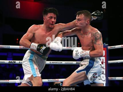 Mauro Perouene (left) and Dalton Smith in the World Boxing Council International Silver Super Light Title at the Motorpoint Arena Cardiff. Picture date: Saturday June 4, 2022. Stock Photo