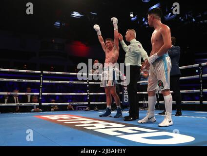 Dalton Smith (left) celebrates victory against Mauro Perouene in the World Boxing Council International Silver Super Light Title at the Motorpoint Arena Cardiff. Picture date: Saturday June 4, 2022. Stock Photo