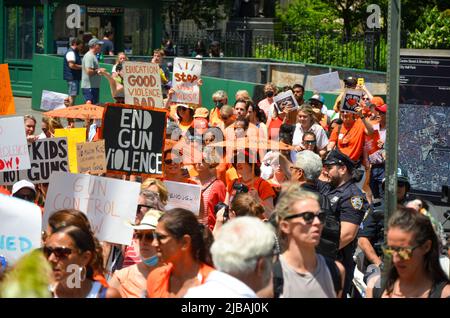 New York, United States. 04th June, 2022. Hundreds of New Yorkers are seen wearing orange while marching across the Brooklyn Bridge, New York City to speak up in support of survivors and gun violence prevention, on June 4, 2022. (Photo by Ryan Rahman/Pacific Press) Credit: Pacific Press Media Production Corp./Alamy Live News Stock Photo