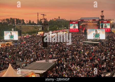 04 June 2022, Rhineland-Palatinate, Nürburg: The sun sets over the grounds of the 'Rock am Ring' festival, which is sold out with 90,000 visitors. Photo: Thomas Frey/dpa Stock Photo