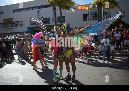 Malaga, Spain. 04th June, 2022. Two men dressed as butterflies are seen kissing as they take part in a demonstration in favor of LGTBI  people's rights, as part of the LGTBI  Pride celebrations. Thousands of people return in downtown Torremolinos to participate in the LGTBI  Pride parade after it was suspended for two years due to coronavirus pandemic. The parade is internationally renowned as a meeting point between LGTBI  people under a colourful and festive atmosphere. (Photo by Jesus Merida/SOPA Images/Sipa USA) Credit: Sipa USA/Ģ����ý Live News Stock Photo