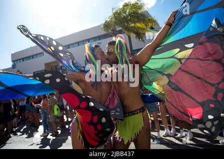 Malaga, Spain. 04th June, 2022. Two men dressed as butterflies are seen kissing as they take part in a demonstration in favor of LGTBI  people's rights, as part of the LGTBI  Pride celebrations. Thousands of people return in downtown Torremolinos to participate in the LGTBI  Pride parade after it was suspended for two years due to coronavirus pandemic. The parade is internationally renowned as a meeting point between LGTBI  people under a colourful and festive atmosphere. (Photo by Jesus Merida/SOPA Images/Sipa USA) Credit: Sipa USA/Ģ����ý Live News Stock Photo