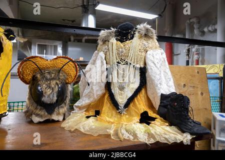 Seattle, Washington, USA. 4th June, 2022. A queen bee costume is prepared at the Powerhouse Art Studio for the 32nd Annual Fremont Solstice Parade. The annual parade, to be held on June 18th, marks the return of the iconic summer solstice celebration after a two year hiatus due to the coronavirus pandemic. Credit: Paul Christian Gordon/Alamy Live News Stock Photo