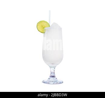 Glass with fresh lemonade inside. Clear glass with ice inside isolated on white background. Slice of lemon on glass. Frozen cocktails Stock Photo