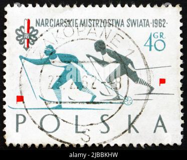 POLAND - CIRCA 1962: a stamp printed in the Poland shows Woman Skiers, World Ski Championships at Zakopane, Poland, circa 1962 Stock Photo