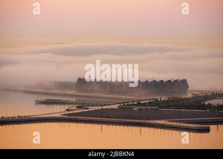 Baku city. Azerbaijan. 16.05.2021 year. Crystal Hall on Primorsky Boulevard in the fog. Stock Photo