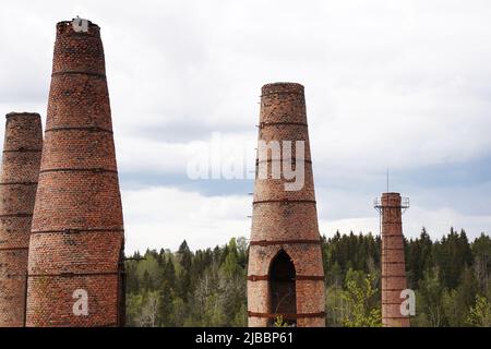 Lime kilns of an abandoned marble and lime factory on a cloudy day. Ruskeala, Karelia Stock Photo
