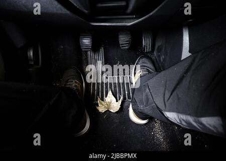 Detail of young man driving, transportation Stock Photo