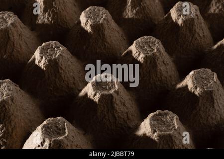 Abstract background. frame geometry. Egg packaging. Paper tray for domestic eggs. Beige and grey. Minimalism. Paper packaging egg carton Stock Photo