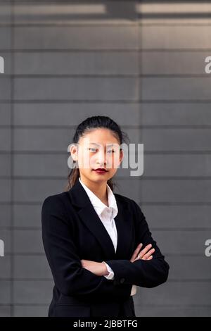 confident entrepreneur woman with arms folded Stock Photo