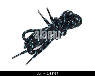 Round laces for hiking boots isolated. Round colored shoelaces on a white background. Top view black natural cotton laces. Stock Photo