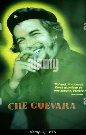 Revolutionary propaganda, poster with Ernesto Che Guevara and revolutionary sayings in the old town of Havana, Cuba, Caribbean Stock Photo