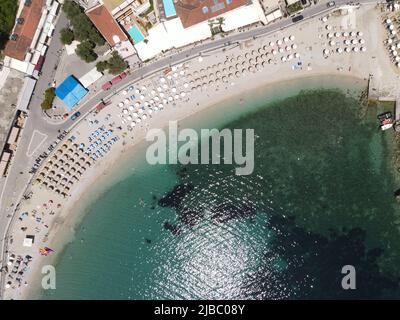 Parga, greek caribbean in preveza, famous tropical destination vacation summer tourist attraction with the deep blue ocean of ionian sea, greece Stock Photo