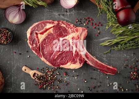 Top view on raw beef american tomahawk steak Stock Photo