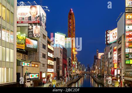 Japan. Kansai. Osaka. Illuminated signboards at Ebisu Bridge on the Dōtonbori Canal Stock Photo