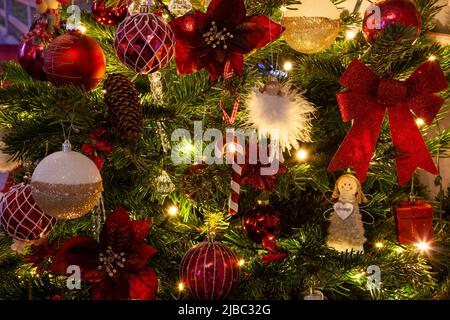 Colourful Christmas baubles and fairy lights, Christmas tree, Stock Photo