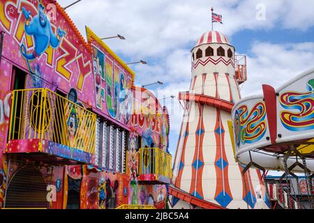 The old-fashioned helter skelter at the Rainbow Park funfair, Hunstanton, Norfolk, England Stock Photo