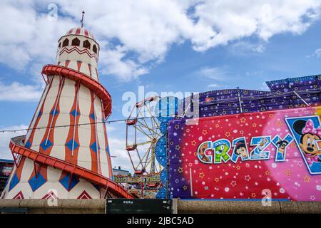 The old-fashioned helter skelter at the Rainbow Park funfair, Hunstanton, Norfolk, England Stock Photo