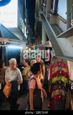 Shoppers and tourists at Patpong night market, Bangkok, Thailand Stock Photo