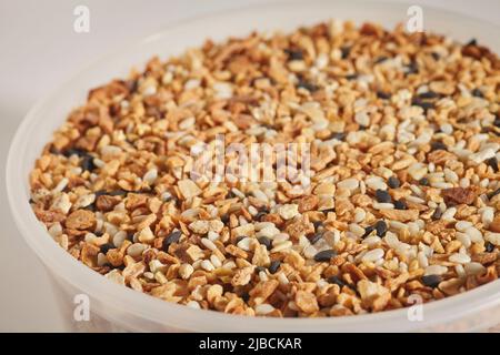 Everything seasoning in a plastic container Stock Photo