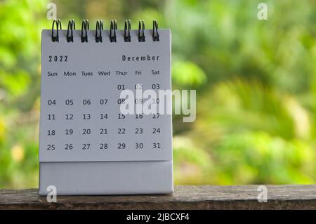 December calendar with blurred nature background. Copy space Stock Photo