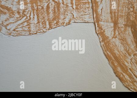 curvilinear abstract background with close-up detail and uneven surface texture, white and light brown background color with empty space for text Stock Photo