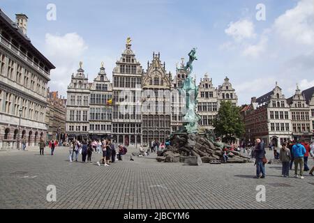 Grote Markt square with old guild houses. Fountain with statue Brabo fountain. Stepped gables, tourists. Center of the Belgian city of Antwerp. Spring Stock Photo