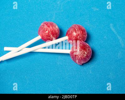 several candies on a blue background. Healthy living concept Stock Photo