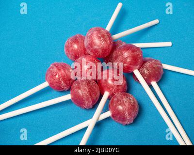 several candies on a blue background. Healthy living concept Stock Photo