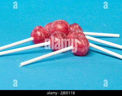 several candies on a blue background. Diabetes concept Stock Photo