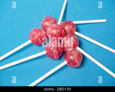 several candies on a blue background. Diabetes concept Stock Photo