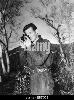 CLARK GABLE on Hunting Trip with Still Camera in April 1937 publicity for Metro Goldwyn Mayer Stock Photo