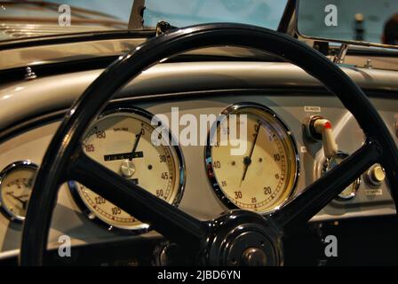 Classic car dashboard and steering wheel Stock Photo