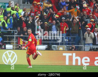 Cardiff City Stadium, Cardiff, UK. 5th June, 2022. World Cup 2022 Qualification Wales versus Ukraine; Gareth Bale of Wales celebrates after scoring his freekick to make it 1-0 in the 35th minute after a deflection by Ukraines defender Andriy Yarmolenko Credit: Action Plus Sports/Alamy Live News Stock Photo