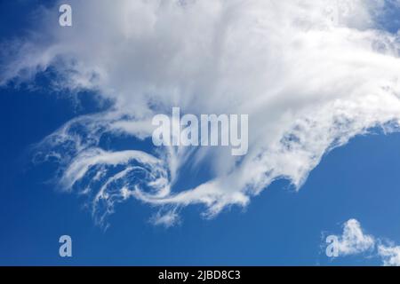 Blue sky and clouds, daylight natural background. Fluffy cumulus cloud, Cloudscape white and grey color.  Fluffy cumulus clouds on blue sky background Stock Photo