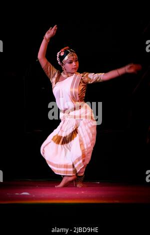 A dancer from the cast of the group Gopesvara performing Bharatanatyam ...