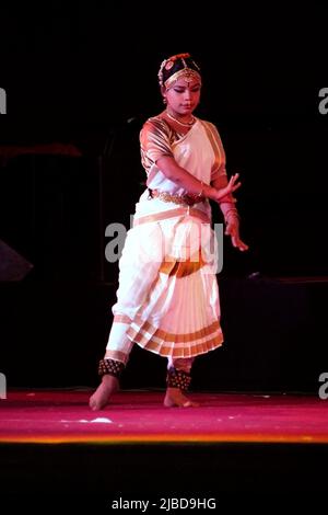 A dancer from the cast of the group Gopesvara performing Bharatanatyam ...