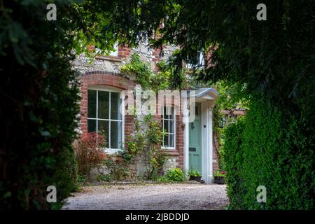 Beautiful country house hidden from view in the Hampshire countryside Stock Photo
