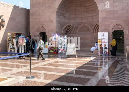 Muscat, Oman, Middle East - February 10, 2020: Tourists visiting the Sultan Qaboos Grand Mosque in Muscat. Oman tour. Stock Photo