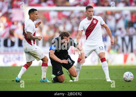 Barcelona, Spain. June 5, 2022, Joe Bell of New Zealand, Yoshimar Yotun and Renato Tapia of Peru during the friendly match between Peru and New Zealand played at RCDE Stadium on June 5, 2022 in Barcelona, Spain. (Photo by Bagu Blanco / PRESSINPHOTO) Stock Photo