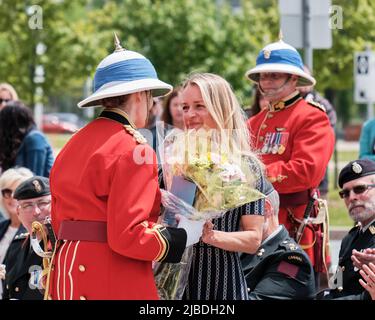 Halifax, Nova Scotia, June 5th, 2022. Lieutenant Colonel Rhonda Matthews takes over command of the Princess Louise Fusiliers at ceremony in Halifax. She here presents flowers to the wife of the exiting LCol Barry Pitcher seen behind. Credit: meanderingemu/Alamy Live News Stock Photo