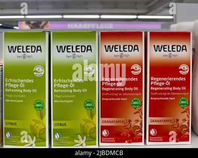 Nuremberg, Germany - June 4, 2022: Different daily care products of brand Weleda standing in shelf on display in german organic super market Stock Photo